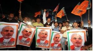 Supporters of Narendra Modi after a court rejected a petition seeking his prosecution in December 2013. EPA