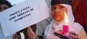 A-girl-protests-against-arrests-of-innocent